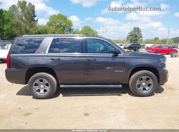 1GNSKBKC1GR450565 2016 CHEVROLET TAHOE Серый Вид задней части салона