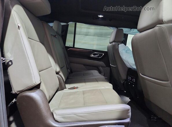 1GNSKCKT1PR513797 2023 CHEVROLET SUBURBAN Green Rear interior view