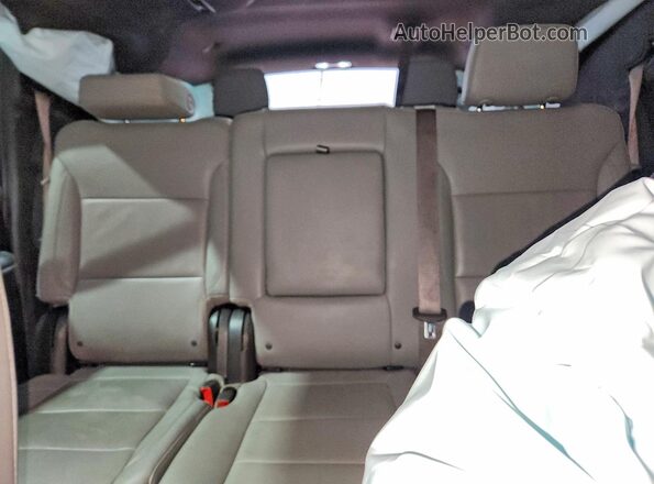1GNSKCKT1PR513797 2023 CHEVROLET SUBURBAN Green Rear seats view