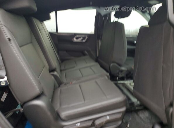 1GNSKLED1RR209943 2024 CHEVROLET TAHOE Silver უკანა სალონის ხედი