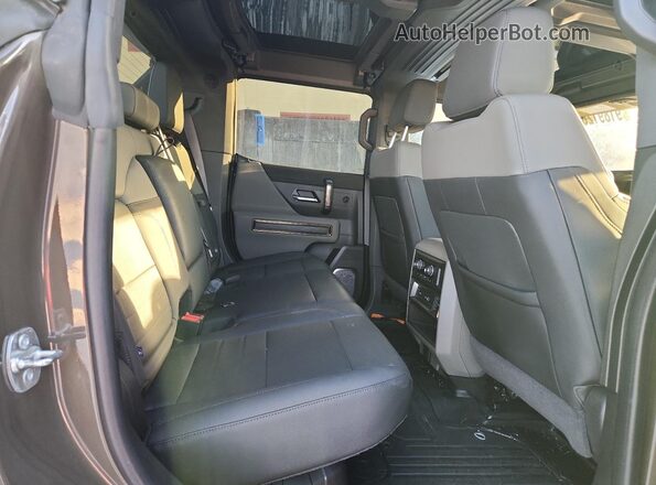 1GT10DDB6RU108779 2024 GMC HUMMER Green Հետևի նստատեղերի տեսք