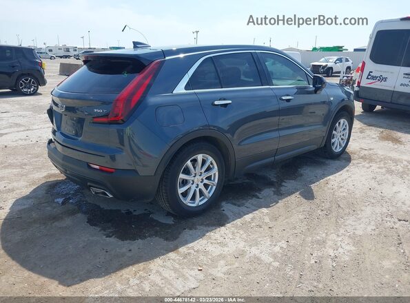 1GYAZAR41MF047699 2021 CADILLAC XT4 Dark Blue Rear right