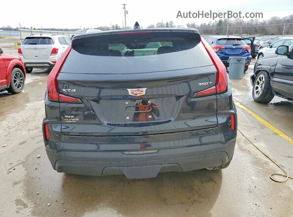 1GYFZBR44RF199057 2024 CADILLAC XT4 Black Вид ззаду