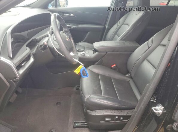 1GYFZBR44RF199057 2024 CADILLAC XT4 Black Вид салону спереду