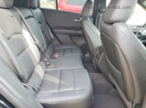 1GYFZBR44RF199057 2024 CADILLAC XT4 Black Вид задньої частини салону
