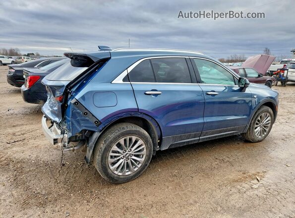 1GYFZDR46SF157605 2025 CADILLAC XT4 Blue Trasero derecho