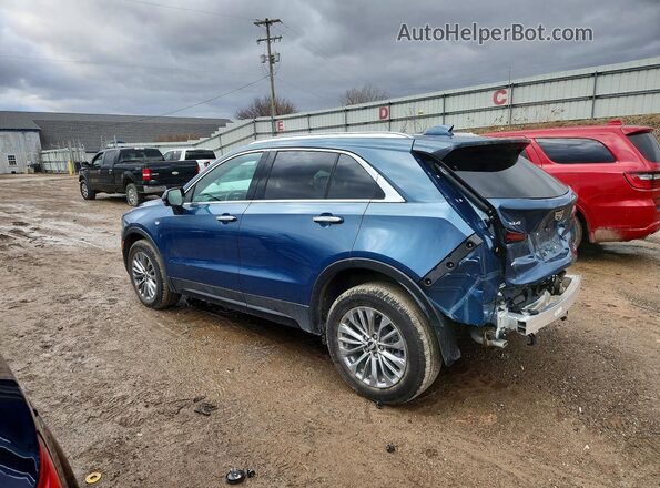 1GYFZDR46SF157605 2025 CADILLAC XT4 Blue Trasero izquierdo