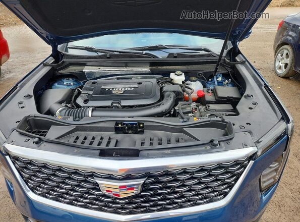 1GYFZDR46SF157605 2025 CADILLAC XT4 Blue Vista del compartimento del motor