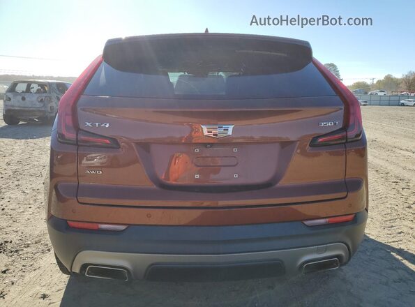 1GYFZDR48MF003724 2021 CADILLAC XT4 Orange 
