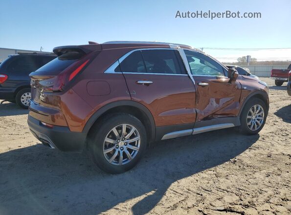 1GYFZDR48MF003724 2021 CADILLAC XT4 Orange 