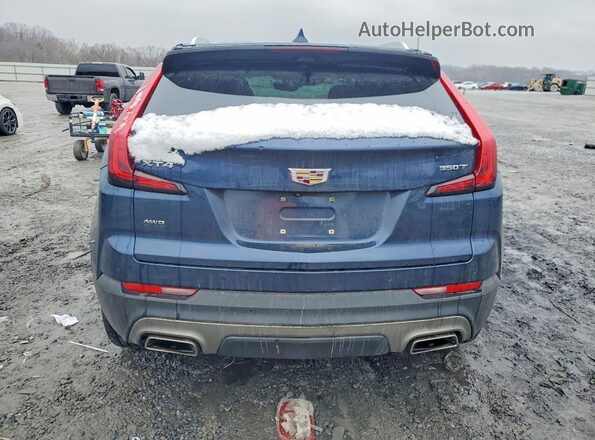 1GYFZDR48MF050574 2021 CADILLAC XT4 Синий Вид сзади