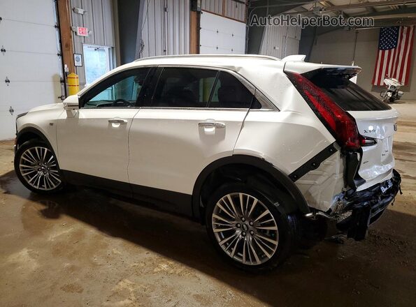 1GYFZDR49SF161311 2025 CADILLAC XT4 White Trasero izquierdo