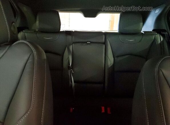 1GYFZDR49SF161311 2025 CADILLAC XT4 White Vista de los asientos traseros