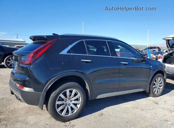 1GYFZDR4XNF131075 2022 CADILLAC XT4 Black Rear right