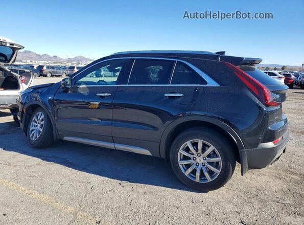 1GYFZDR4XNF131075 2022 CADILLAC XT4 Black Rear left