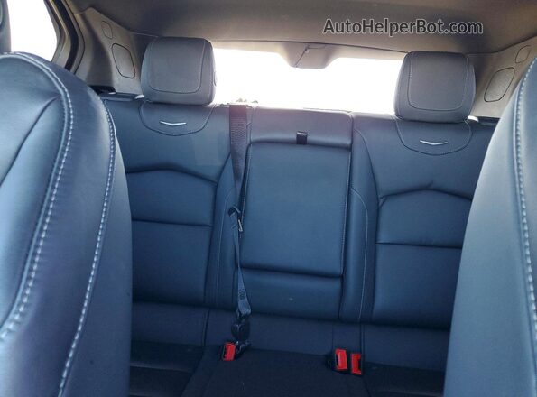 1GYFZDR4XNF131075 2022 CADILLAC XT4 Black Rear seats view
