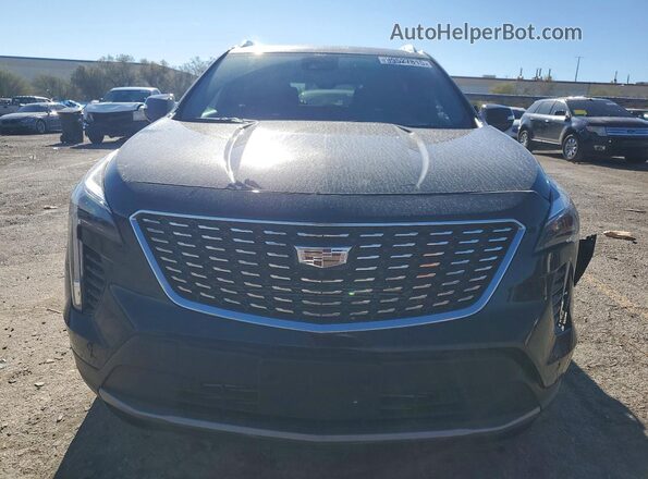 1GYFZDR4XNF131075 2022 CADILLAC XT4 Black Front view