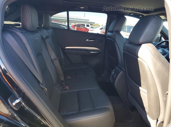 1GYFZDR4XNF131075 2022 CADILLAC XT4 Black Rear interior view