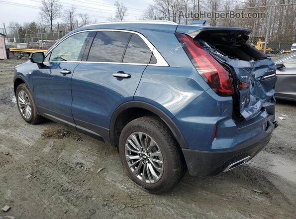 1GYFZDR4XRF166107 2024 CADILLAC XT4 Blue Tył lewy