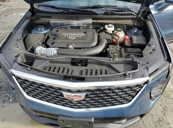 1GYFZDR4XRF166107 2024 CADILLAC XT4 Blue Widok komory silnika