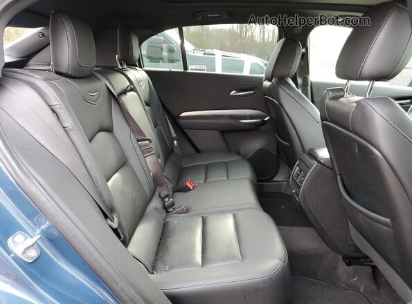 1GYFZDR4XRF166107 2024 CADILLAC XT4 Blue Widok wnętrza z tyłu