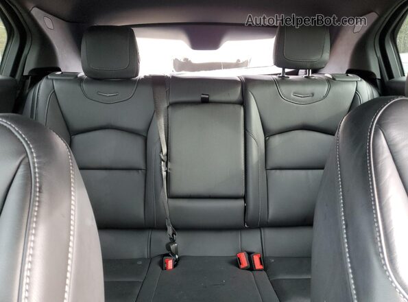 1GYFZDR4XRF166107 2024 CADILLAC XT4 Blue Widok tylnych siedzeń