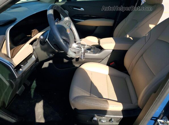 1GYFZDR4XSF154223 2025 CADILLAC XT4 Синий Вид салона спереди