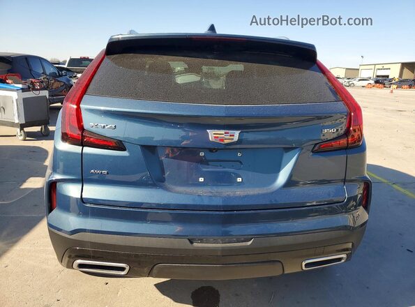1GYFZDR4XSF154223 2025 CADILLAC XT4 Синий Вид сзади
