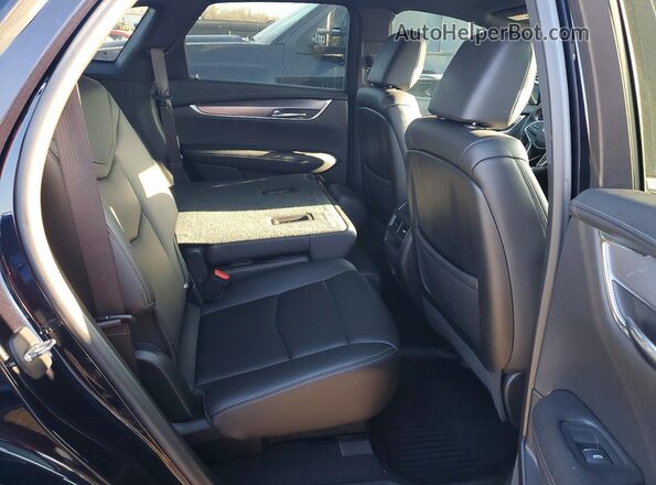 1GYKNAR4XMZ184607 2021 CADILLAC XT5 Black Սալոնի հետևի տեսք