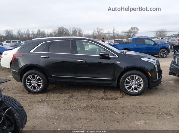 1GYKNDRS3LZ228686 2020 CADILLAC XT5 Black Vista interior trasera