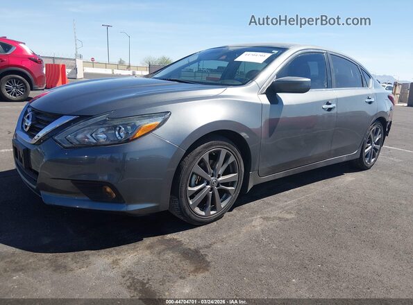 1N4AL3AP2JC284827 2018 NISSAN ALTIMA Gray Առջևի ձախ երեք քառորդ տեսարան