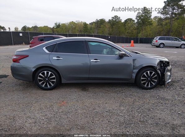 1N4AL3AP4JC131009 2018 NISSAN ALTIMA Gray Widok wnętrza z tyłu