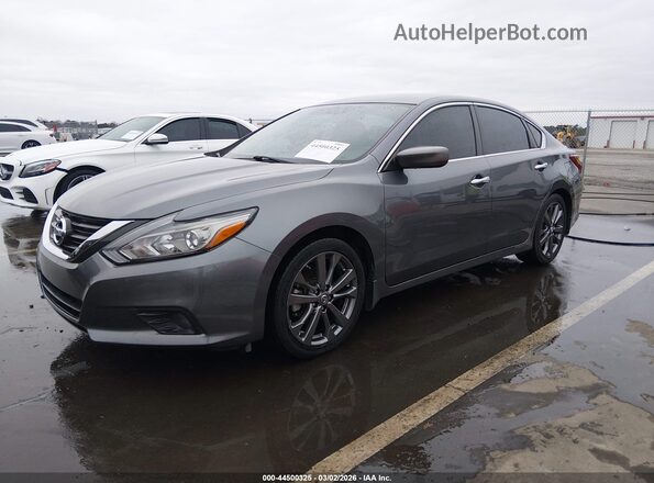 1N4AL3AP8JC235566 2018 NISSAN ALTIMA Gray Vista tres cuartos delantera izquierda