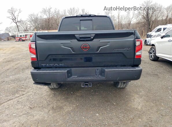 1N6AA1ED6RN112950 2024 NISSAN TITAN Black Հետևի տեսք