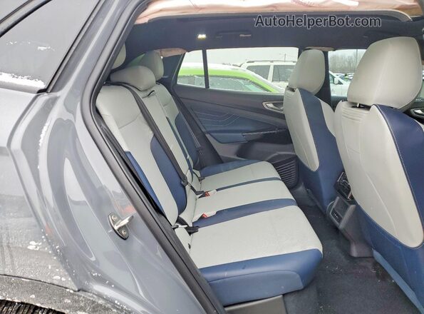 1V25MPE87SC006539 2025 VOLKSWAGEN ID.4 Серый Вид задней части салона