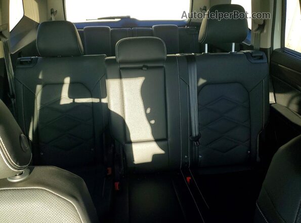 1V2WN2CA5TC524581 2026 VOLKSWAGEN ATLAS White Vista de los asientos traseros