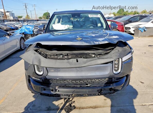 7FCTGAAA4PN001004 2023 RIVIAN R1T Gray Vista trasera