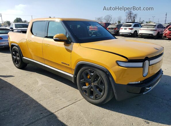 7FCTGAAA2PN019677 2023 RIVIAN RIT Yellow Դիմացի տեսք