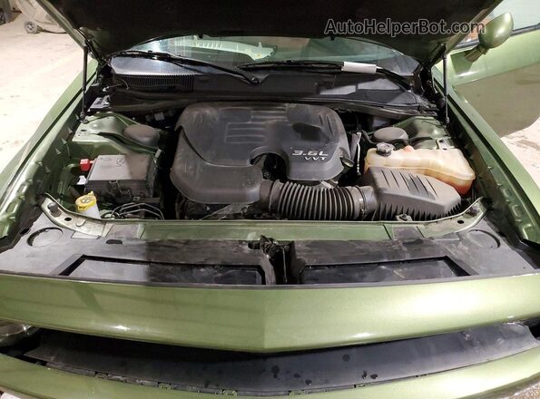 2C3CDZKG0MH568562 2021 DODGE CHALLENGER Green Vista interior trasera