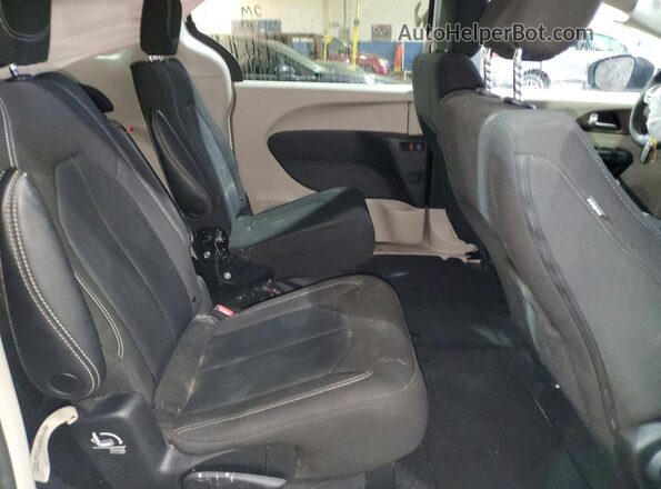 2C4RC1CG2PR623665 2023 CHRYSLER VOYAGER White Vista interior trasera