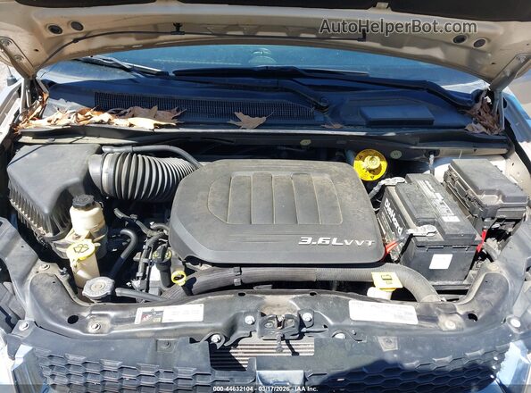 2C4RDGCG2GR219555 2016 DODGE GRAND CARAVAN Gold Rear view