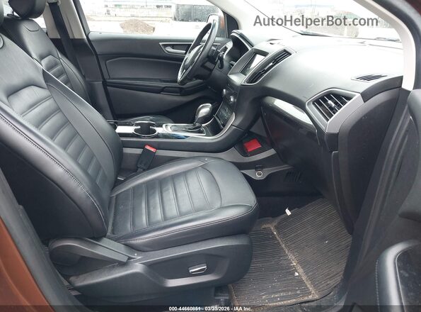 2FMPK4J8XHBB40261 2017 FORD EDGE Brown Vista interior delantera