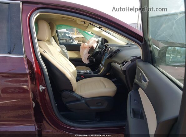 2FMPK4J90MBA15384 2021 FORD EDGE Maroon Vista interior delantera