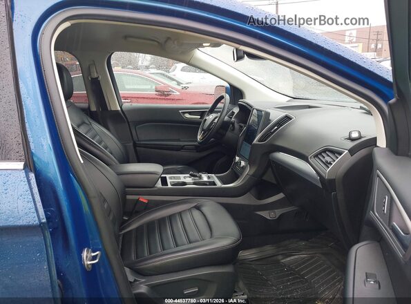 2FMPK4J91NBA38156 2022 FORD EDGE Blue Widok wnętrza z przodu