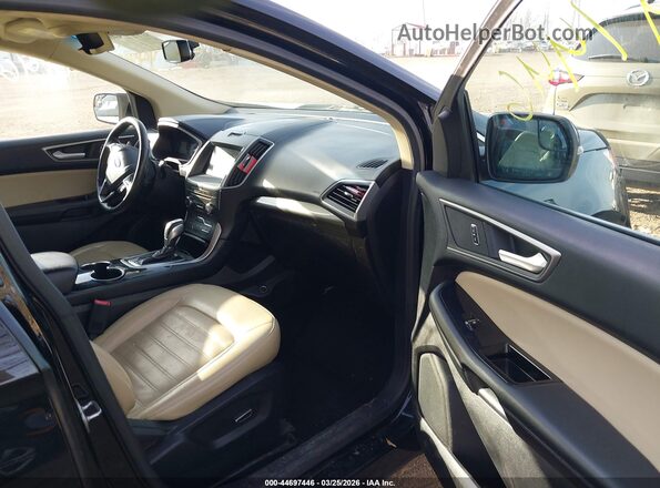 2FMPK4J92HBB20935 2017 FORD EDGE Black Front interior view