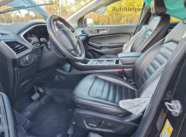 2FMPK4J95MBA57176 2021 FORD EDGE Black Вид салону спереду