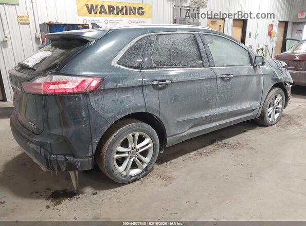 2FMPK4J96KBB93328 2019 FORD EDGE Blue Trasero derecho