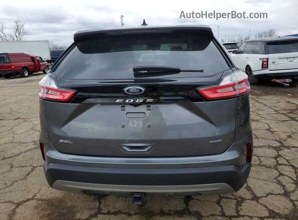 2FMPK4J99RBA36693 2024 FORD EDGE Gray Vista trasera