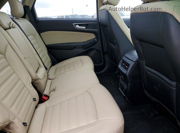2FMPK4J99RBA36693 2024 FORD EDGE Gray Vista interior trasera