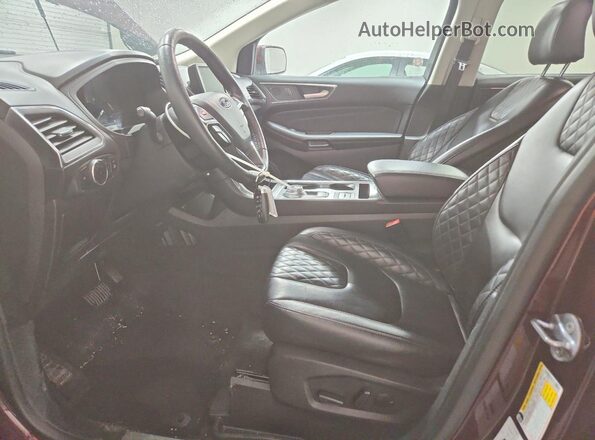 2FMPK4K93RBA89100 2024 FORD EDGE Maroon Front interior view